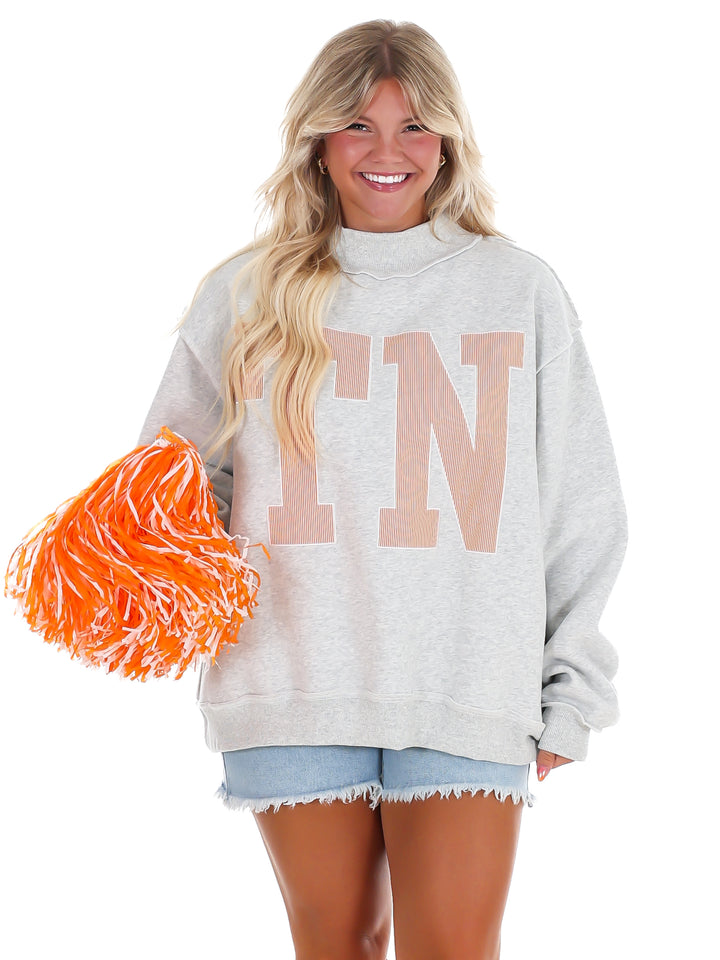 Stripe Embroidered TN Mock Neck Sweatshirt