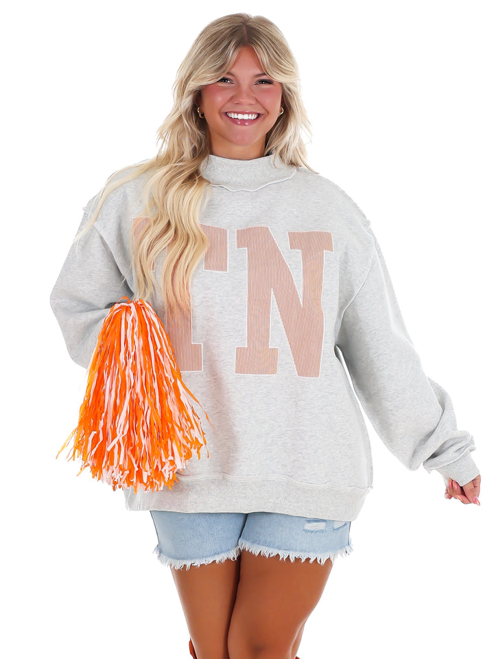 Stripe Embroidered TN Mock Neck Sweatshirt