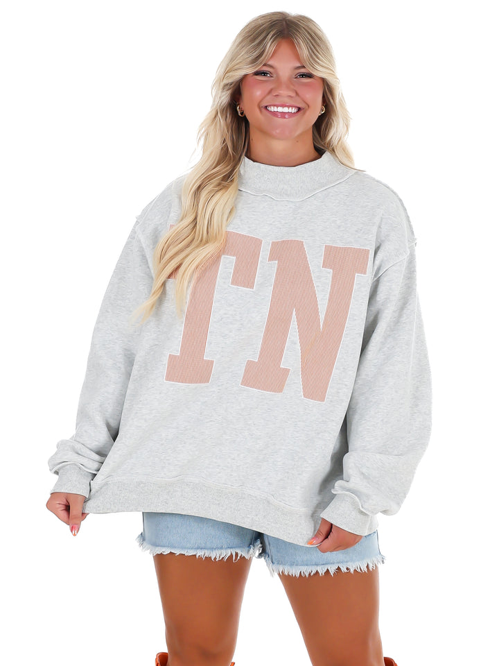 Stripe Embroidered TN Mock Neck Sweatshirt