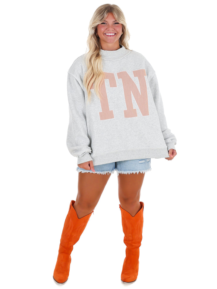 Stripe Embroidered TN Mock Neck Sweatshirt