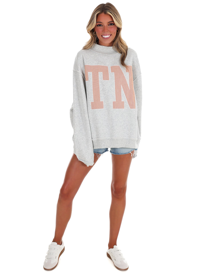 Stripe Embroidered TN Mock Neck Sweatshirt
