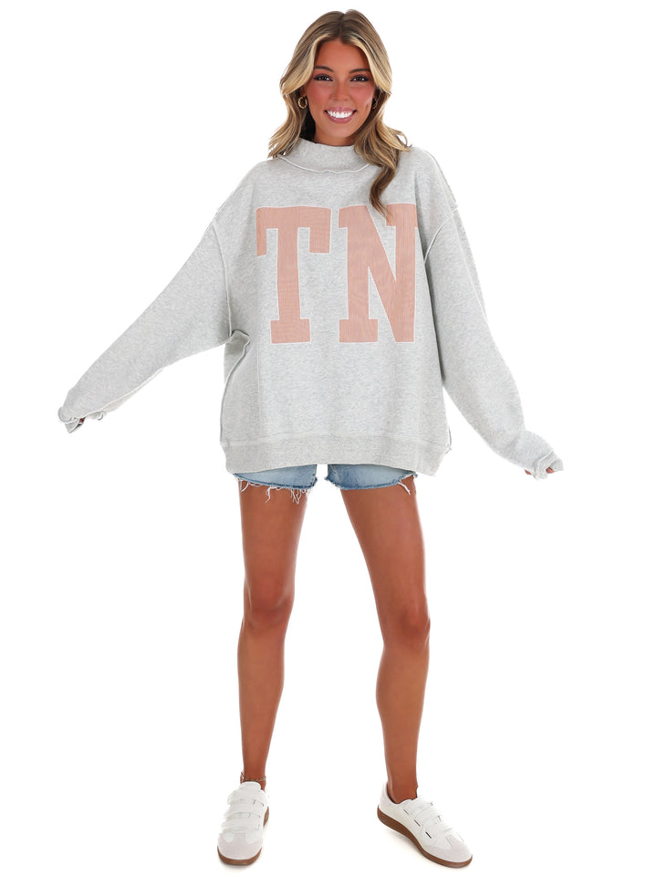Stripe Embroidered TN Mock Neck Sweatshirt