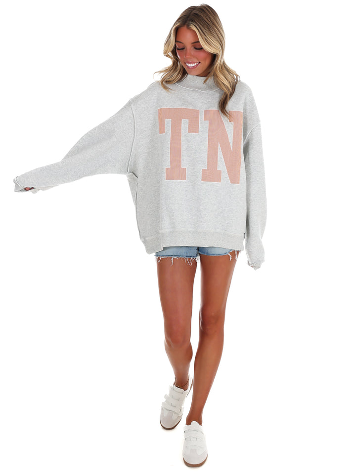 Stripe Embroidered TN Mock Neck Sweatshirt