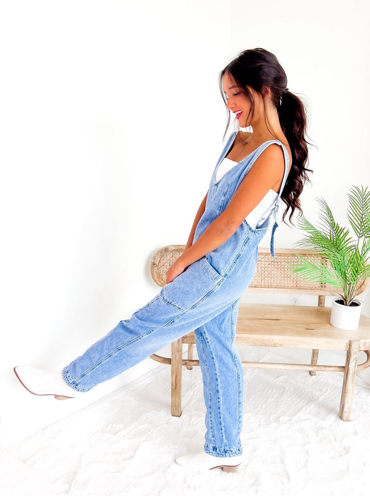 Free People High Roller Light Blue Denim Jumpsuit