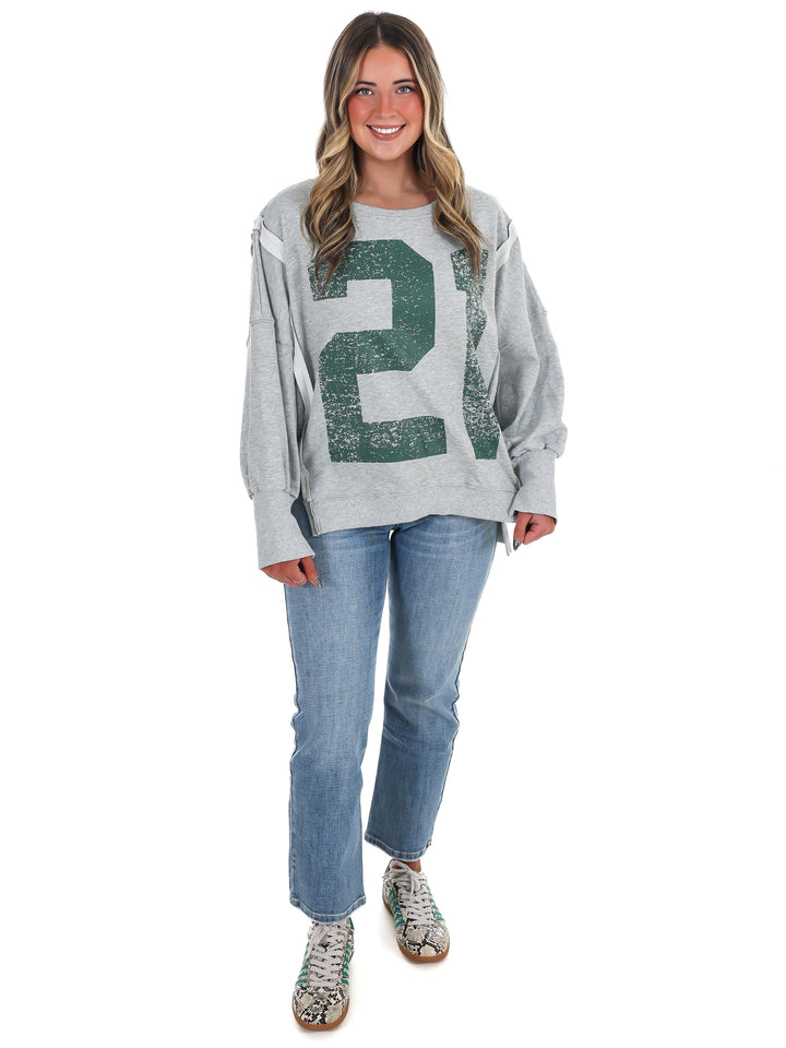Faded Varsity Print Pullover Top