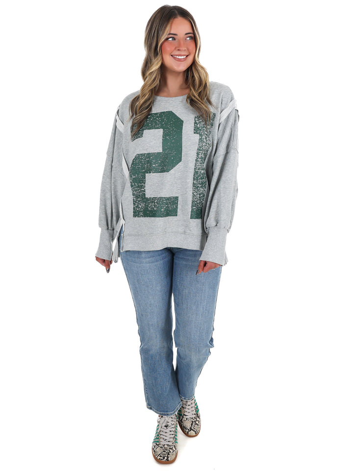 Faded Varsity Print Pullover Top