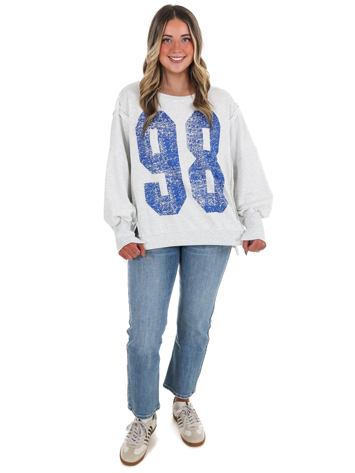 Faded Varsity Print Pullover Top