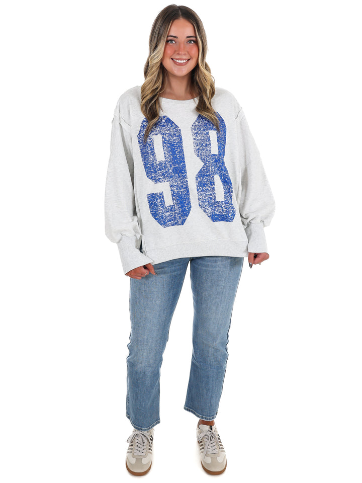 Faded Varsity Print Pullover Top