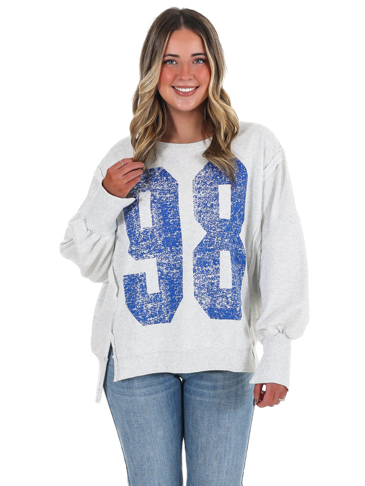Faded Varsity Print Pullover Top